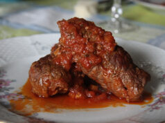 Braciola di maiale con funghi e prosciutto